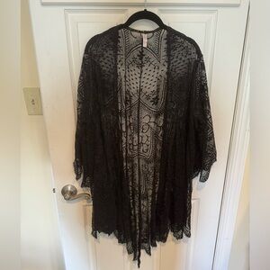 Lacey black tunic.